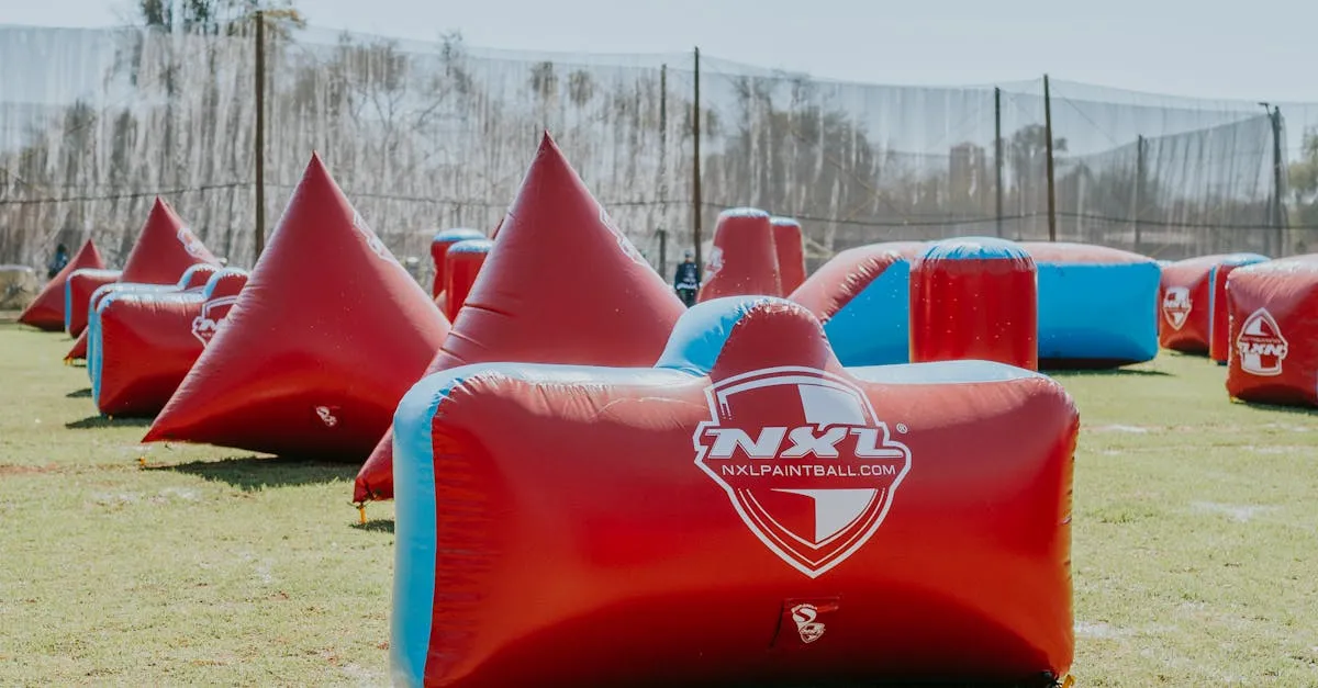 Inflatable speedball field with red and blue bunkers set up for fast-paced tournament play