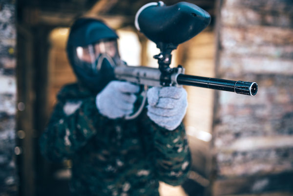 paintball player with gun